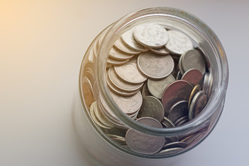 glass jar-piggy Bank with small change