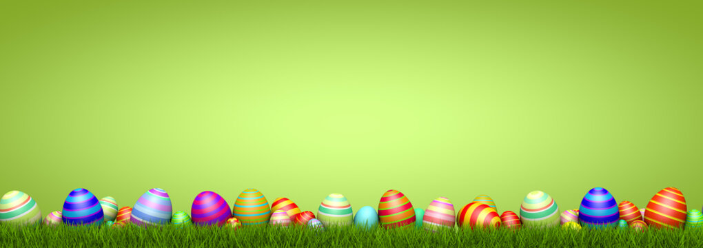 Ostereier im Gras / Ostern / Hintergrund gr&uuml;n