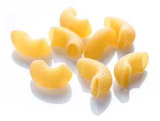 Macaroni pasta close up isolated on white background