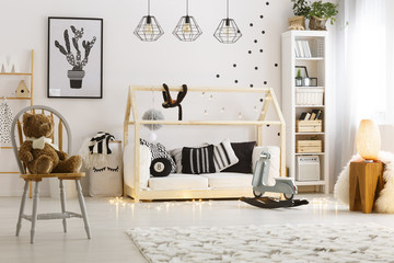 Bright child bedroom with lamps