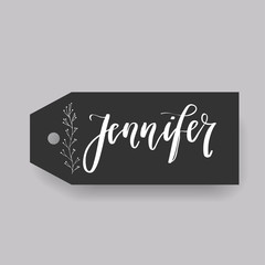 Common female first name Doris on a tag. Hand drawn calligraphy. Wedding typography element.