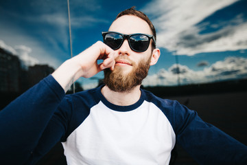 Hipster man with beard wearing glasses