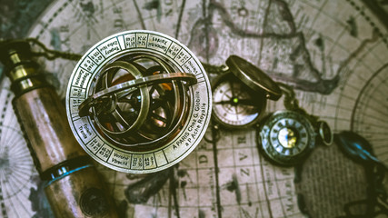 Antique nautical compass and ocean adventure accessory tools. - obrazy, fototapety, plakaty