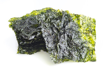 Japanese food nori dry seaweed sheets on white background © showcake