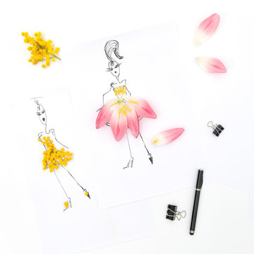 Flat lay with sketch book tulip mimosa flowers