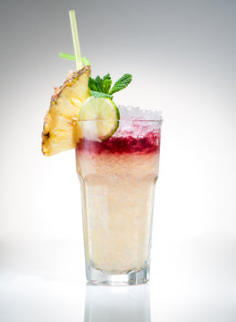 tropical maitai cocktail with pineapple slice