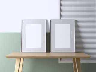 Two blank frame poster mock up on the table in the interior. 3d rendering