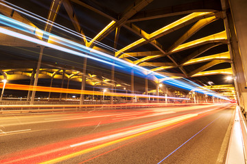 Fototapeta na wymiar busy traffic on bridge at night