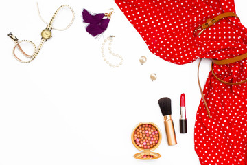 feminine red dress, earrings, watches, pearl bracelet, makeup brush and lipstick.