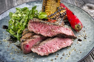 Barbecue Wagyu Tagliata with Salad and Vegetable as close-up on a plate