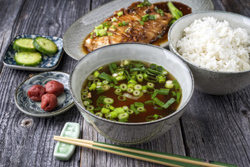 Traditional Japanese Fish Teriyaki with Rice and Miso Soup as close-up