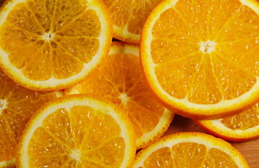 Background of sliced  juicy oranges fruit