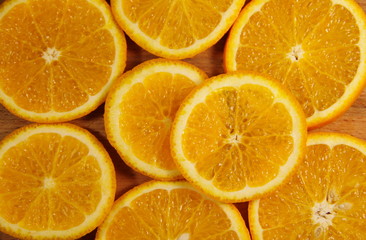 Fototapeta premium Background of sliced juicy oranges fruit