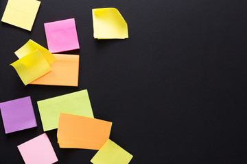 Color notes on black board, copy space