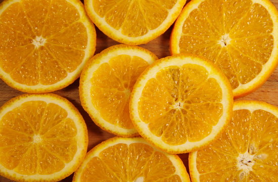 Background of sliced  juicy oranges fruit