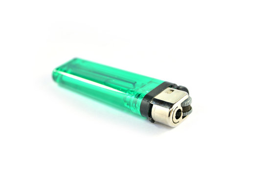 Green gas lighter isolated on a white background.