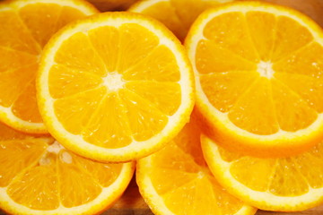 Background of sliced  juicy oranges fruit