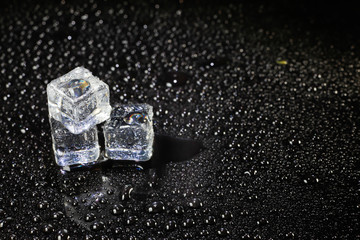 ice cubes on black background.