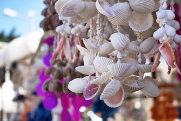 Handmade wind chimes made with mussell, crab, oyster, scallop shells in Bodrum city of Turkey. The image reflects Aegean and Mediterranean culture and lifestyle.