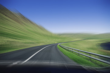 Fototapeta premium Fast driving on mountain road