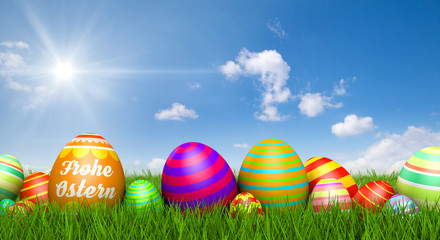 Frohe Ostern / Ostereier im Gras / Himmel