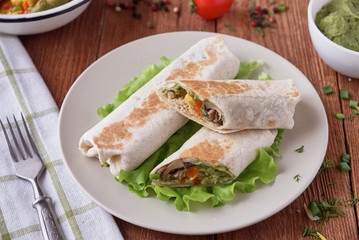 Burito with chicken mushrooms and vegetables