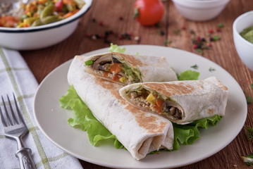 Burito with chicken mushrooms and vegetables