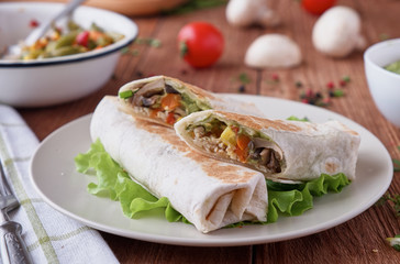 Burito with chicken mushrooms and vegetables