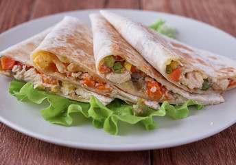 Quesadilla with cheese, chicken, mushrooms and vegetables