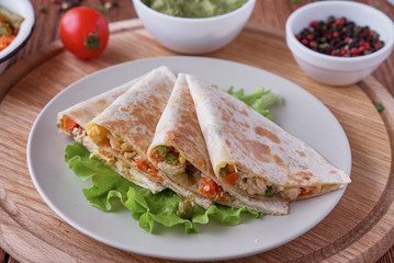 Quesadilla with cheese, chicken, mushrooms and vegetables