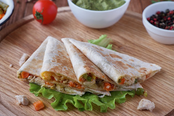 Quesadilla with cheese, chicken, mushrooms and vegetables
