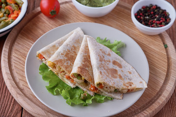 Quesadilla with cheese, chicken, mushrooms and vegetables