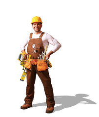 Builder in yellow helmet, protective glasses and working clothes