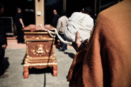 Thai buddhism monk religious prayingl for the cremation. The corpse in the coffin prepared for burning in the cremate.