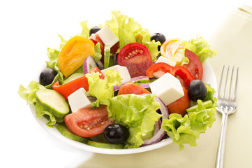 fresh vegetable salad isolated on white background
