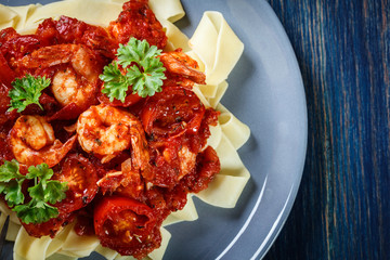 Pappardelle pasta with shrimp, tomatoes and herbs