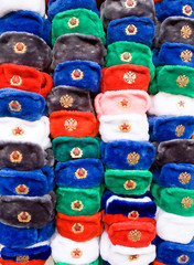 Multicolored caps with Soviet cockades are sold in the center of Moscow for tourists.