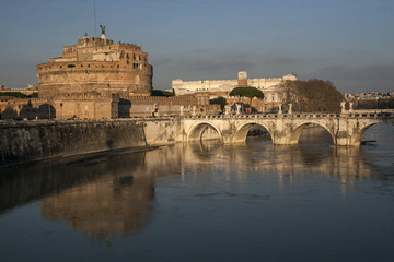 Castle San Angelo, alongside the bridge over the Tiber River in Rome, Italy. Golden late afternoon lighting. Near Vatican.
