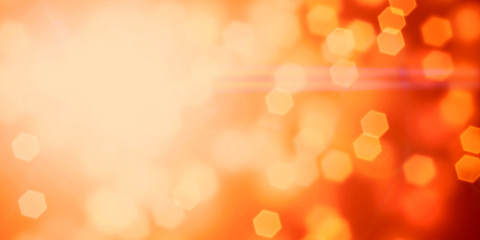 Obraz premium hexagon bokeh effect background banner in shades of yellow, orange, brown and white