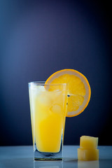 Orange juice and slices of orange fruit