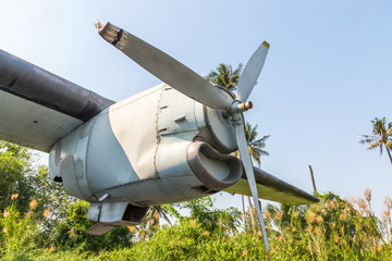 Propeller on the side of the old plane.