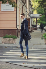 Hipster man walking in the streets