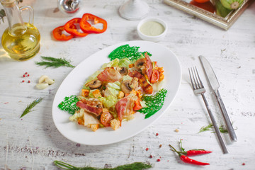 Salad with bacon mushrooms greens and cherry