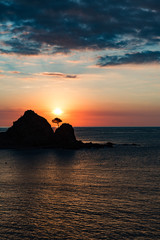 View of the sunrise from the cliff in Tossa del Mar