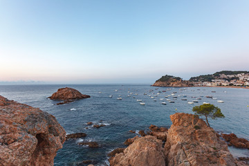 View of the fortress and the coastline in Tossa del Mar in the early morning