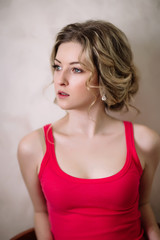 Fototapeta premium Portrait of pretty young woman against grunge background