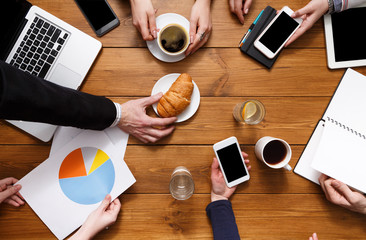 Coffee break or business lunch, top view close-up