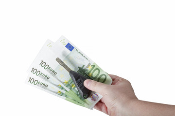 Obraz na płótnie Canvas Hand holding euro bills and car keys isolated