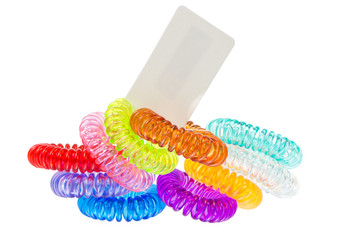 Isolated bunch of  sppiral hair ties with price tag