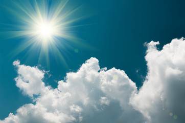 Naklejka na ściany i meble clouds in the blue sky and sun, natural background